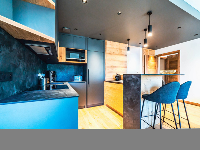 Cuisine ouverte, moderne et lumineuse.